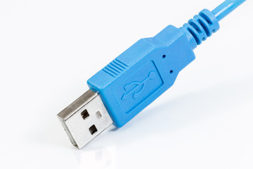 Blue USB cable on a white background. - 275708549