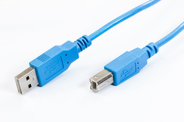 Blue USB cable on a white background. - 275708566