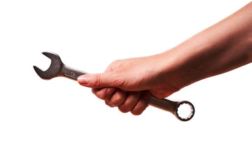 Girl holding a wrench in her hand