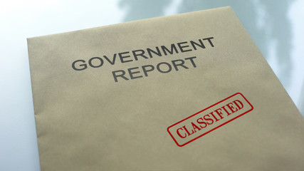 Government report classified, seal stamped on folder with important documents