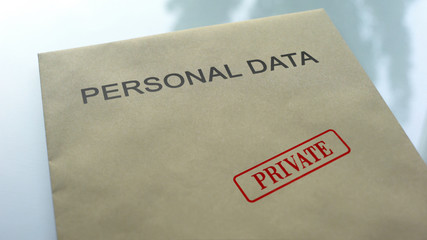 Personal data private, seal stamped on folder with important documents