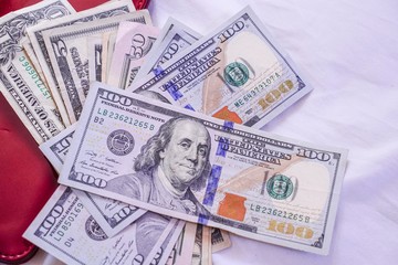 Money from america. Notes of Real, USA Dollars currency. Concept of economy, inflation and business. Wallet with money banknotes background.