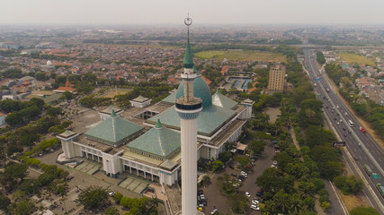 aerial view mosque in Indonesia Al Akbar in Surabaya, Indonesia. beautiful mosque with minarets on island Java Indonesia. mosque in an asian city