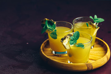 Cold cocktail with squeezed pineapple juice