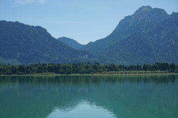 Forggensee is in Bavaria and on the shore Ludwig the Bavarian king built his castle Neuschwanstein