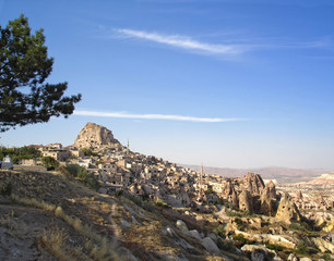 Panoramic view of natural rock castle of Uchisar - the highest point and famous tourist destination in Cappadocia, Turkey