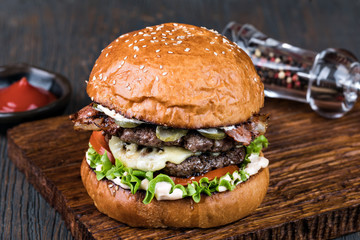 Burger on a wooden board