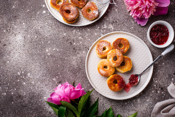 Homemade donuts with rose jam