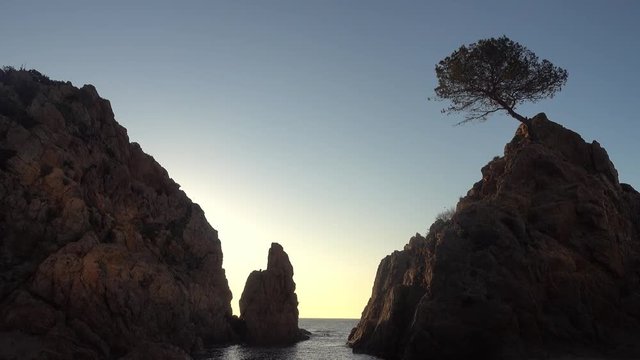 The small sea in Tossa de Mar at sunrise