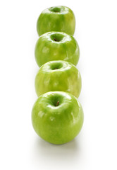 four green apples isolated on white background