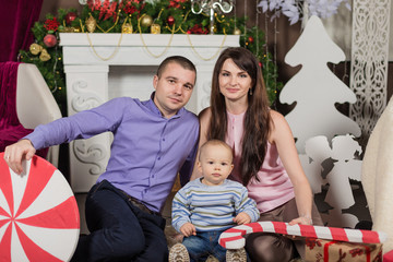 A large family are all helping serve Christmas dinner