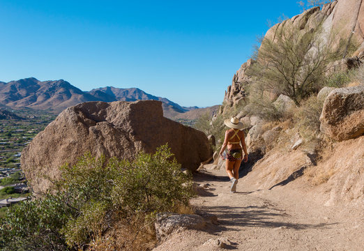 Woman Hiking On Pinnacle Peak Desert Trail In Scottsdale, AZ