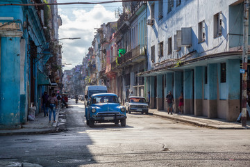 Street view of the Old Havana City, Capital of Cuba, during a vibrant and bright sunny morning.