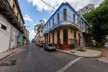 Fototapeta na wymiar Residential Street view of the Old Havana City, Capital of Cuba, during a bright and sunny day.