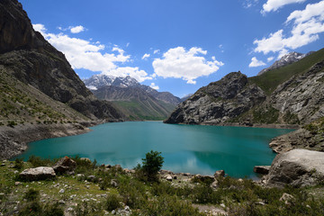 Fototapeta na wymiar Fan Mountains in Tajikistan are one of Central Asia is premier trekking destination. The beautiful seven lake trek from Penjikent. View on the lake number six