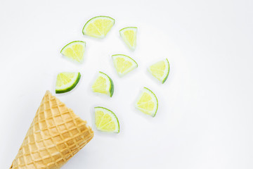 Creative layout of fresh fruits, nuts and ice cream cone. Flat lay. Summer concept.