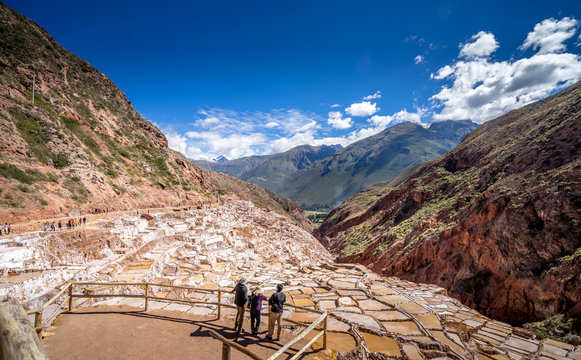visitors viewing Salt extraction pans in Peru