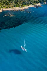 Stoff pro Meter View from above, stunning aerial view of a sailing boat floating on a beautiful turquoise clear sea. Maddalena Archipelago National Park, Sardinia, Italy. © Travel Wild