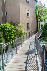 Bridge over a small water canal in the old town of Augsburg, Germany