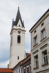 Fototapeta na wymiar Tower of the Church of St. Giles & the Virgin Mary Royal in the old town of Trebon, Czech Republic