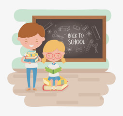 little students couple with chalkboard and school supplies