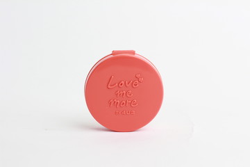 Cream blusher for women. Small compact beauty product.