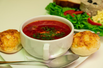 National Jewish borsch with pumpushki and greens