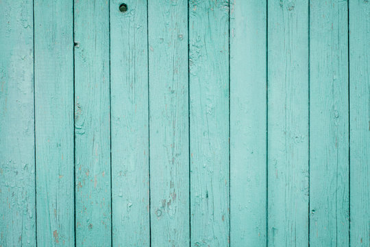 Teal or turquoise green painted wood background texture