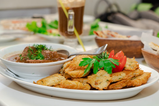 National Jewish dish - Fleish mit latex - beef stew with potato pancakes