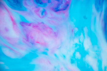 Fototapeta na wymiar Sublime Galaxy Abstract Background Texture. Stunning and enchanting swirls of vibrant blues and pinks. Graphic resource. Feeling of space, the ocean and dreams are evoked. Magical landscape. 