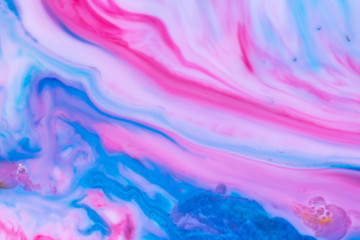 Fototapeta na wymiar Cotton Candy Waves Background Texture Magical and enchanting swirls of vibrant blues and pinks. Crashing waves of dreams. Graphic resource. Feeling of space, the ocean and dreams.
