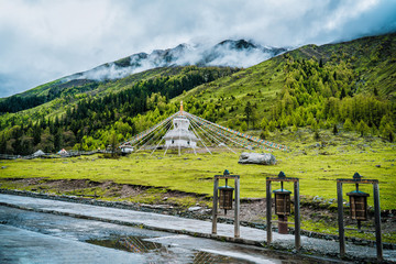 Sichuan Four Girl Mountain (Siguniang Mountain) Shuangqiaogou in Sichuan China, beautiful White tower