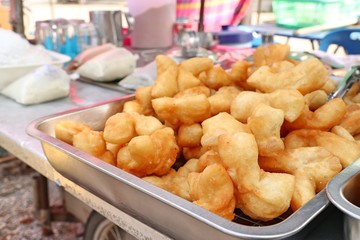 Deep-fried dough stick at market