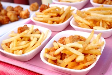 French fries and fried chicken at market