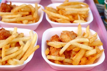 French fries and fried chicken at market