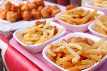French fries and fried chicken at market