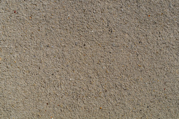 The surface of the cement is small gravel mix for design. Patterns of wall and floor gravel