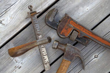 Old Vintage Tools on Weathered Wood