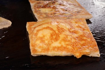 Making of dessert sweet roti