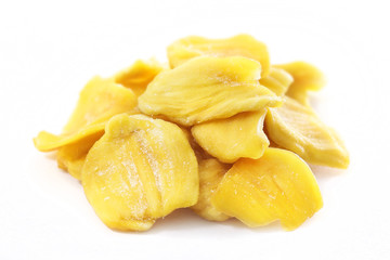 Close up of a pile of dried jackfruit chips isolated on white background. Sugar granules wrap around the dried jackfruit.