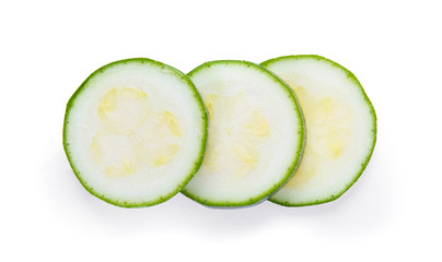 Sliced zucchini isolated on white background, top view