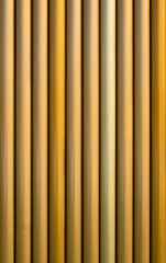 Fototapeta premium Golden glossy pipe lines background.