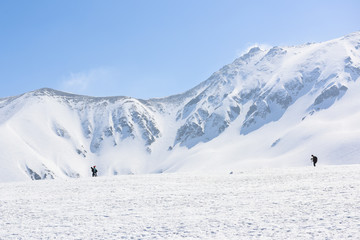 Fototapeta na wymiar snowy peak with clear blue sky