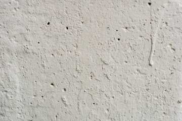 Texture, wall, concrete, it can be used as a background. Wall fragment with scratches and cracks