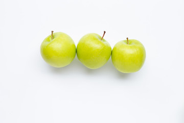 Green apples on white background.