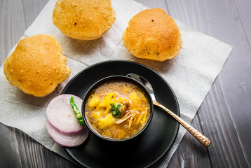Puri and Potato Curry - famous breakfast of india