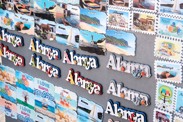 Alanya, Turkey-June 15, 2019: gift shop. There are a lot of fridge magnets in the window. Tourists buy magnets with the names of the places where they come to rest or travel.