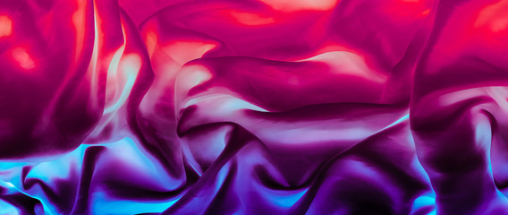 Colourful artistic silk waves, holiday background