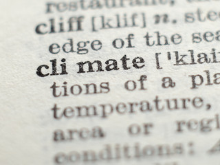 Dictionary definition of word climate, selective focus.