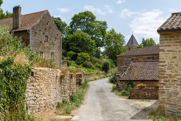 Fototapeta na wymiar Road in medieval Berze village, France